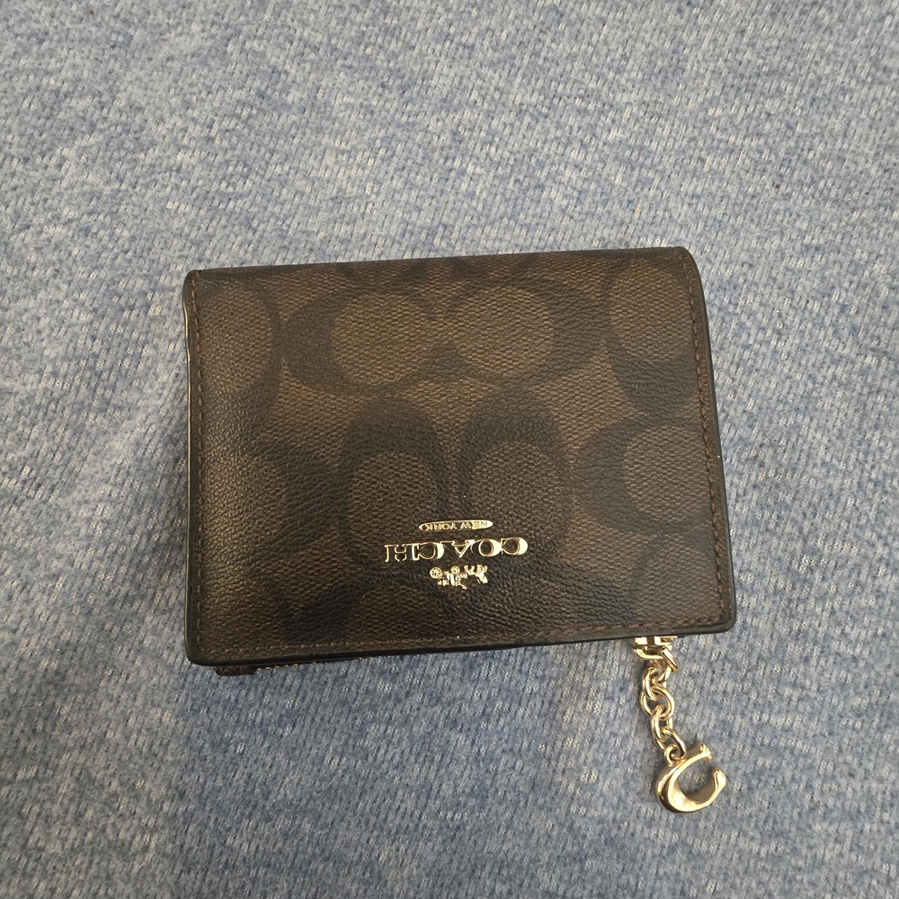 Brown and Black Coach Wallet